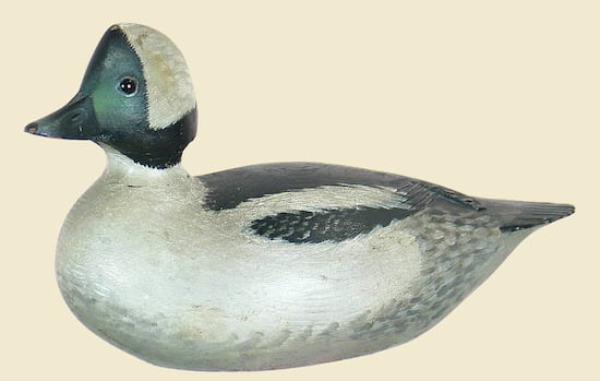 Easily the top lot of the auction was this rare and important bufflehead drake by A. E. (Elmer) Crowell ($207,000).