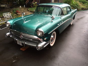 1957 Buick Special, turquoise blue inside and out, in showroom condition with lots of chrome ($8,610).