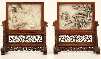 Pair of 18th or 19th century Chinese carved jade table screens, titled Figures Among Stream and Mountainous Landscape, each panel 5 inches by 6 inches (est. $5,000-$10,000). 